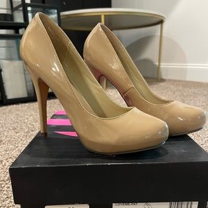 Paten leather heel/round toe. 3”